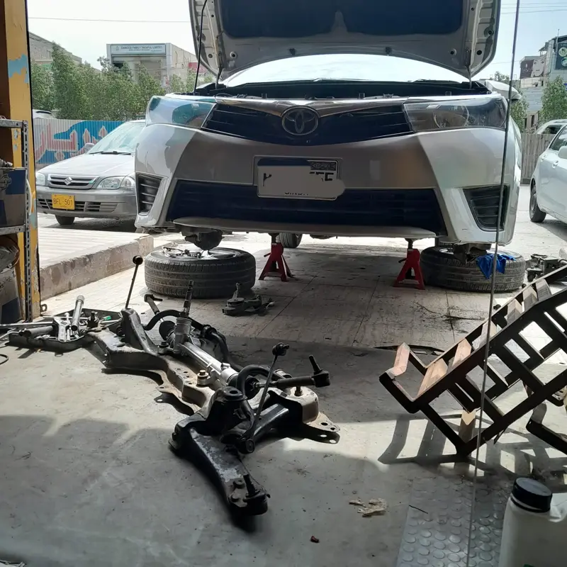 Car suspension inspection and shock absorber replacement in Karachi