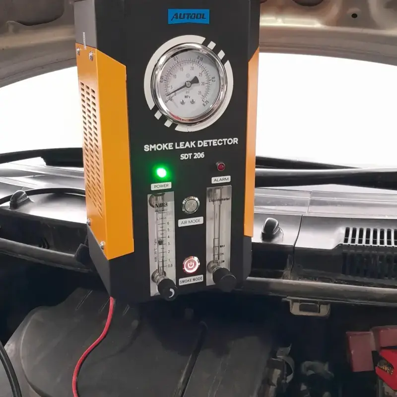 EFI system diagnostics using a professional smoke leak detector at Lambda Garage Karachi